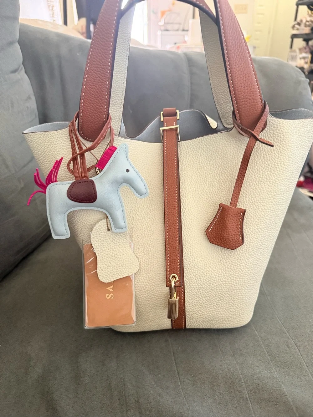 Cream and Brown Women's Pebbled Leather Tote with Horse Charm